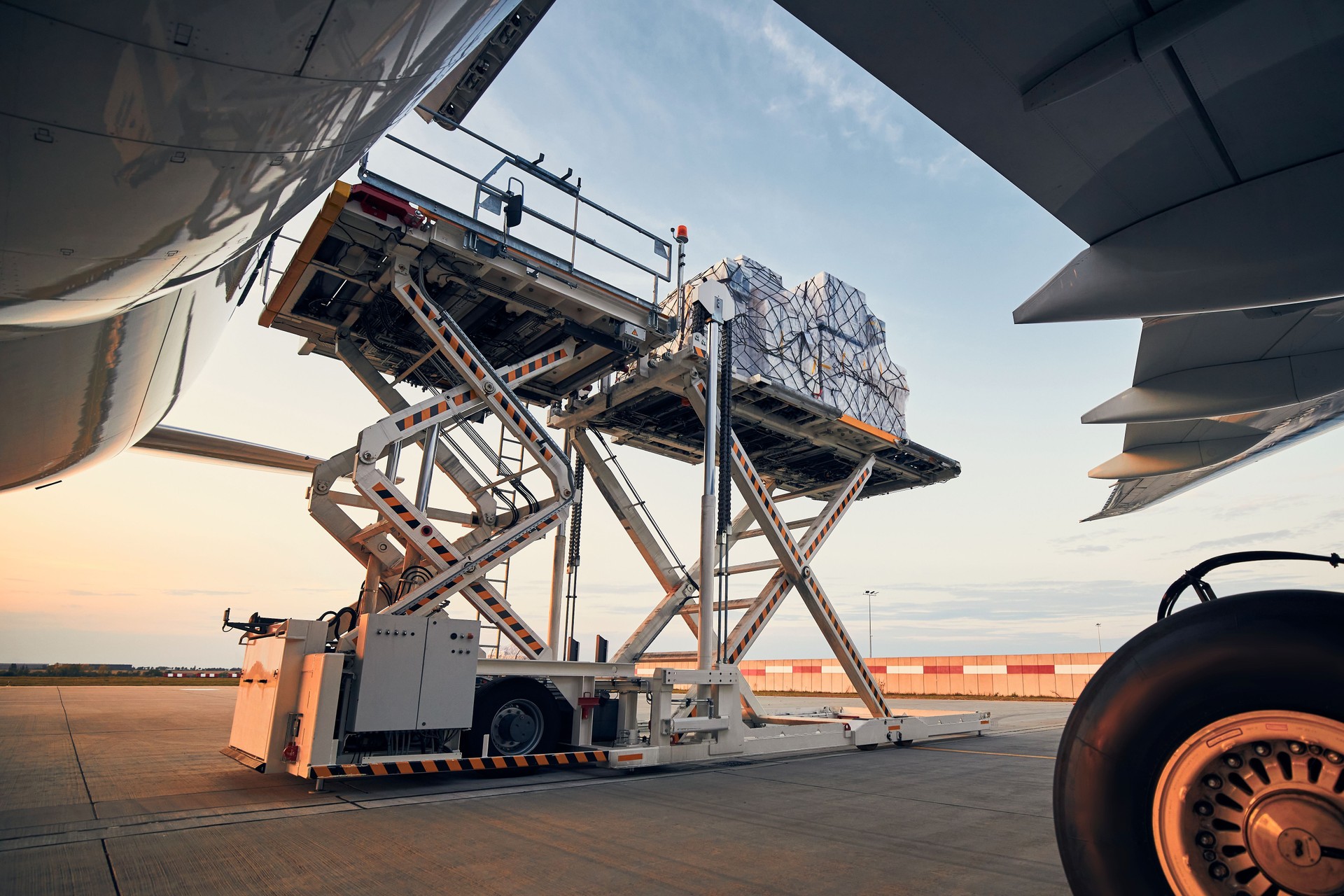 Loading of cargo containers to airplane ESG Consultancy